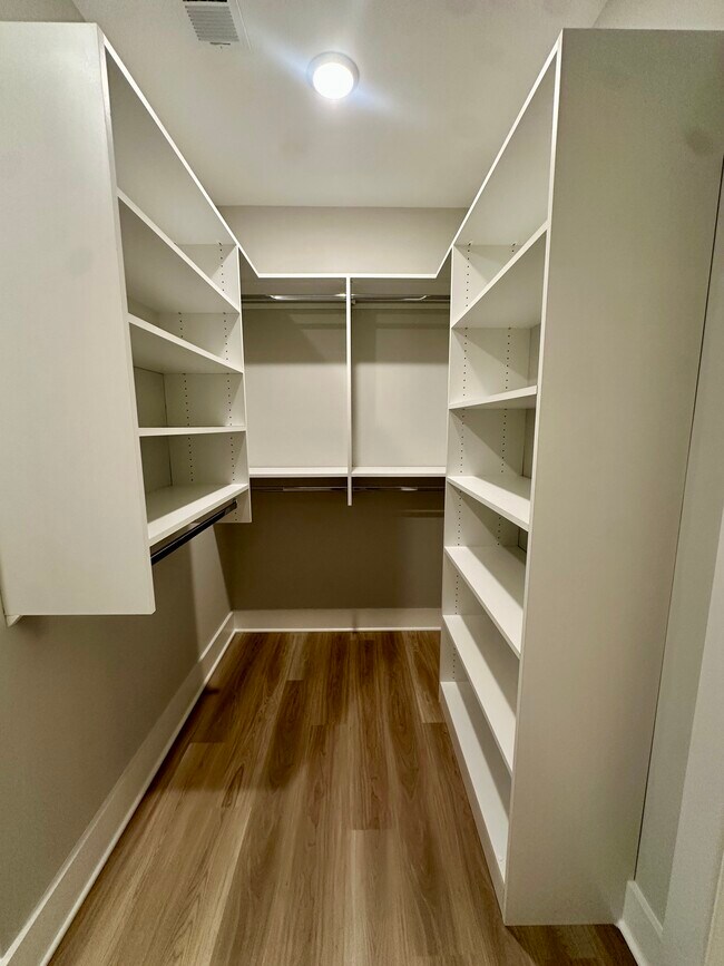 Very large walk in closet in Primary