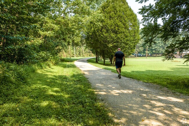 Locals enjoy the long shaded trails at Campbell Creek Neighborhood Park near Silverwood.