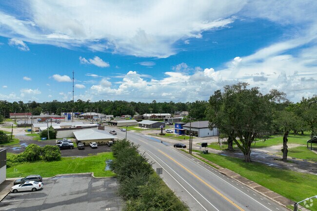 Burger King and other small businesses line Highway 71.
