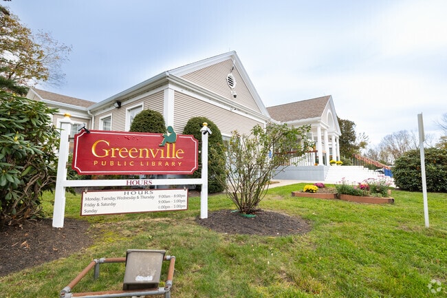 Greenville Public Library off Putnam Pike is in an attractive building on a busy thoroughfare.