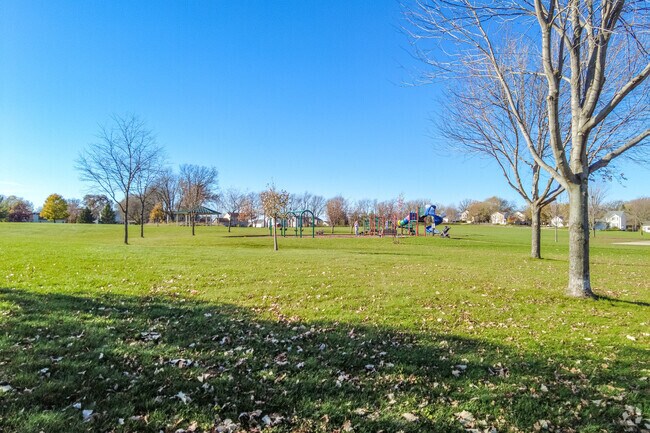 The playground at Glacial Drumlin is a popular spot for families.