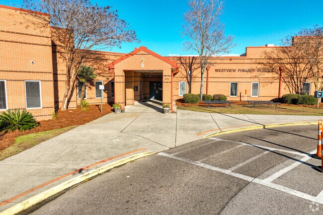 Westview Primary School welcomes students through the front entrance in the morning.