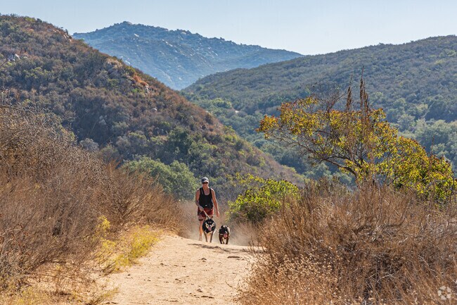 Mountains punctuate the skyline of North Broadway and offer miles of hiking trails.