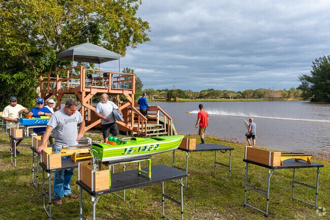 RC boat enthusiasts having fun at Markham Park near Sunshine Village.