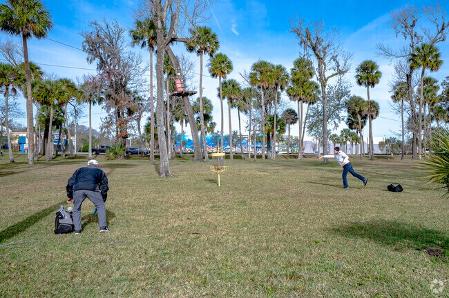 Play a round of disc golf at Tuscawilla Park near Neighborhood K.