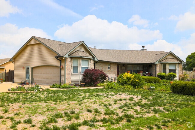 Crestview Heights yards are often decorated with flowers and small bushes.