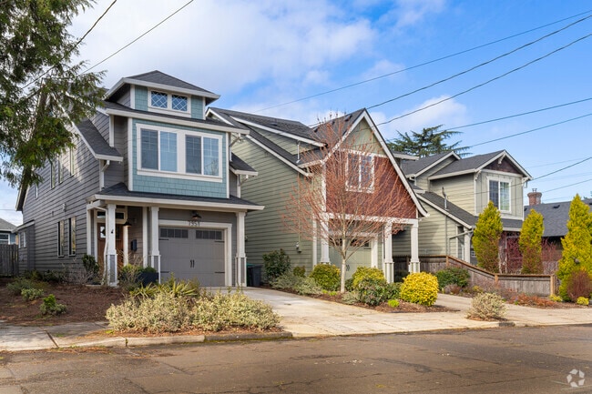 A row of colorful modern traditional homes in the Portsmouth neighborhood.