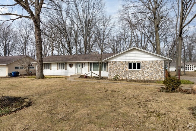 Some Ranch-style in houses in Amherst sit on wooded lots.