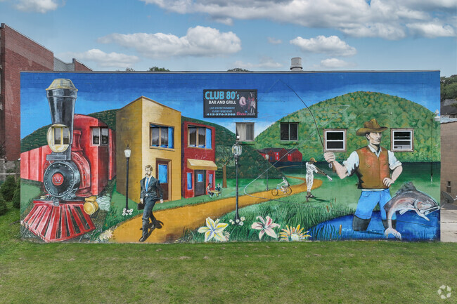 A mural of Trafford showcasing what the town is known for.