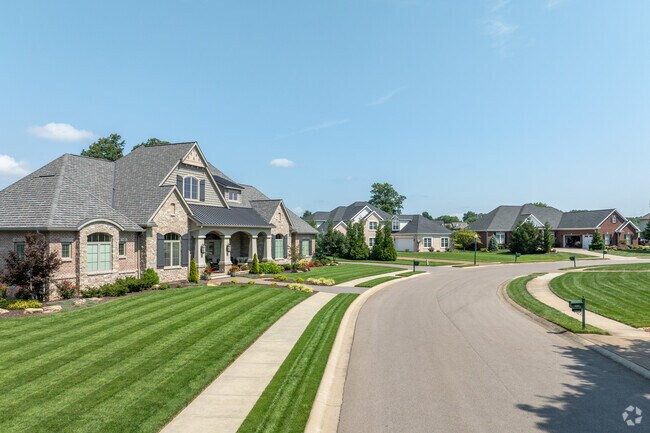 Wide streets with sidewalks make Cambridge Village a walkable neighborhood.