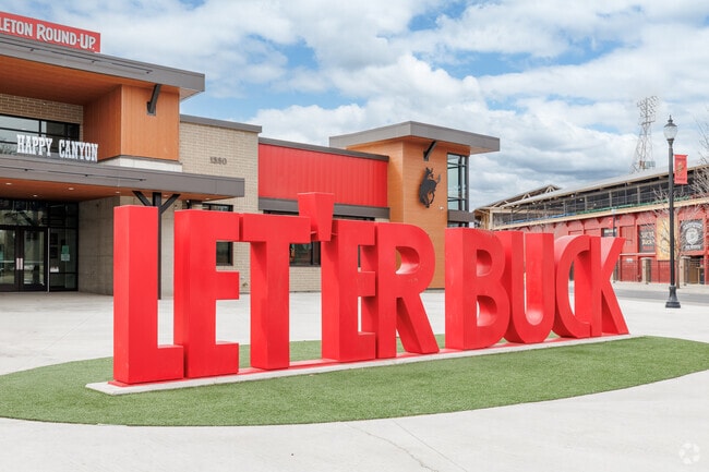 Locals embrace the Let 'Er Buck phrase, celebrating Pendleton's famous annual rodeo events.