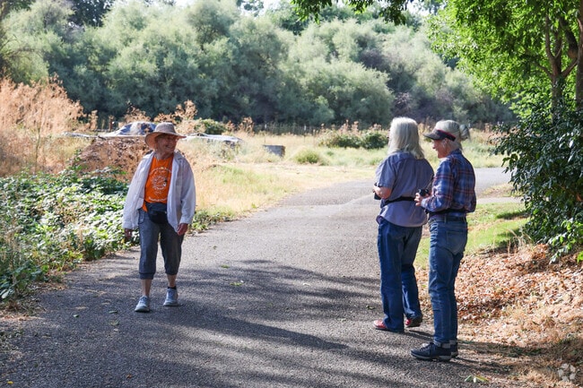 It's common to seeing people enjoying the walking paths throughout Mountain Ranch.