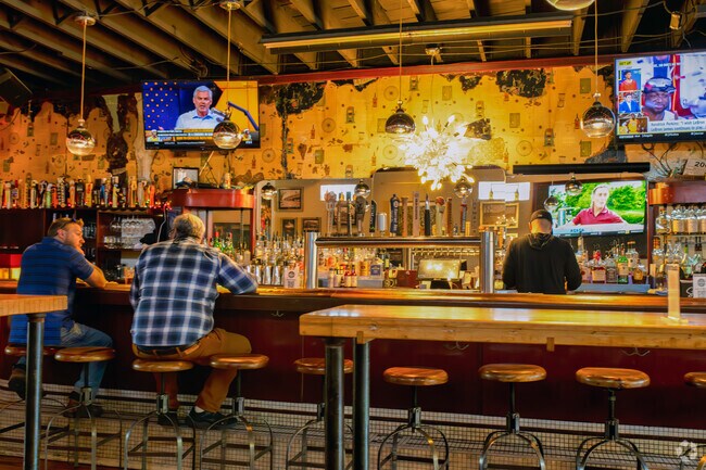 Friends enjoy a drink at the bar in Zoobie's Tavern, an Old Town favorite near Northtown.