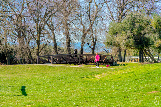 A walking bridge connects Lennox Park with Corning Community and Skate Park.