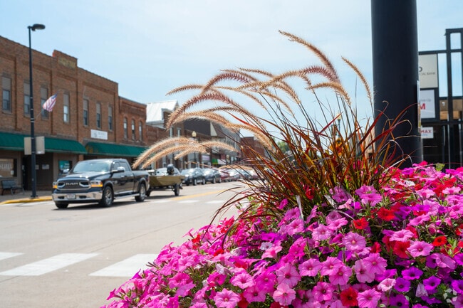 Seasonal plantings brighten Bloomer’s downtown streetscape.