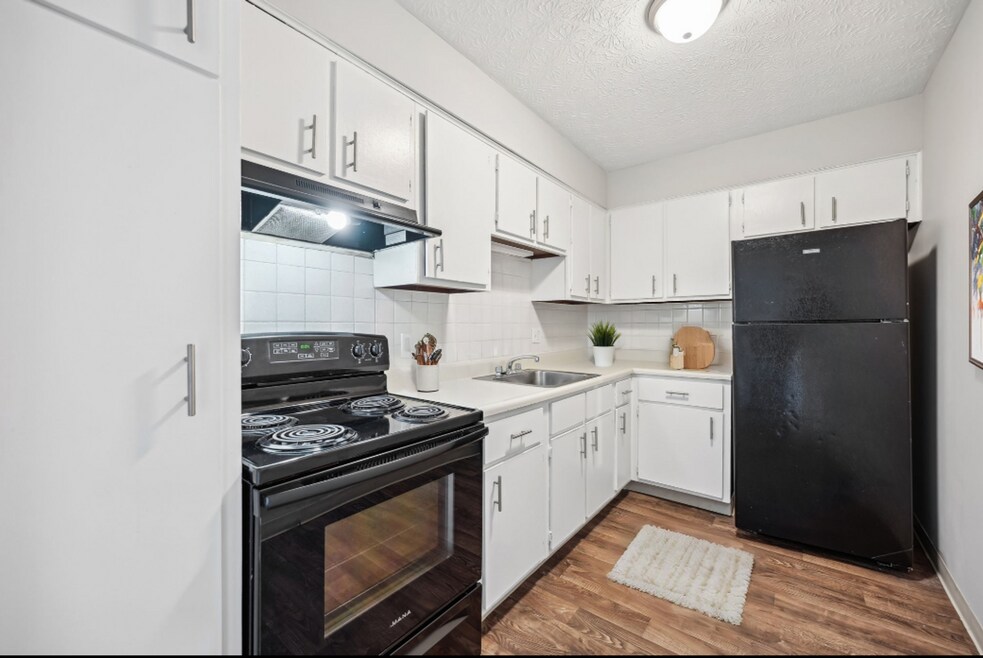 Tamarack Arms Apartments