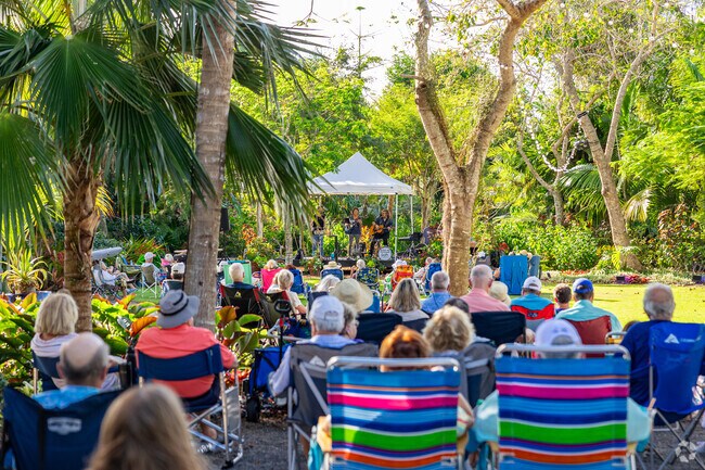 Music in the Garden attendees enjoy the music of local bands near South Naples.