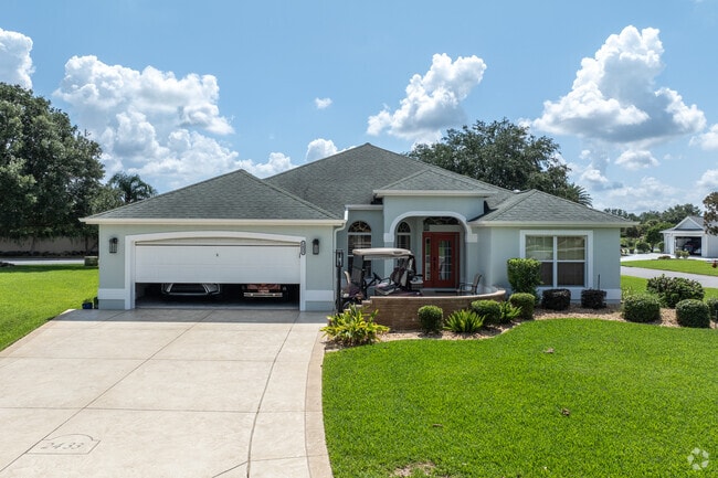 Village of Belvedere homes often feature golf cart parking.