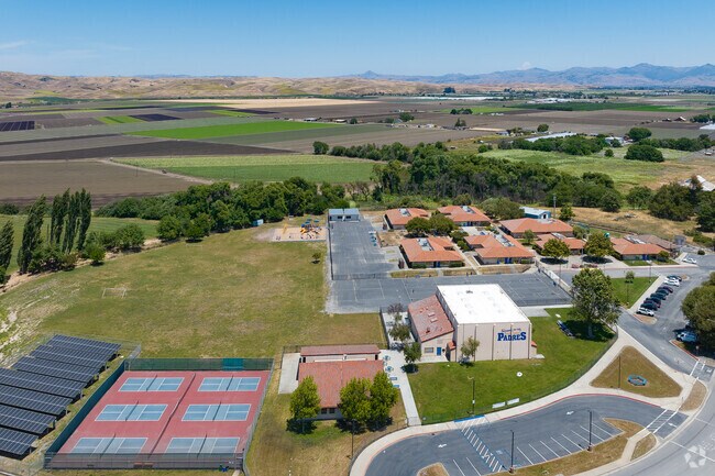 San Juan School with rolling hills in background in San Juan Bautista, California