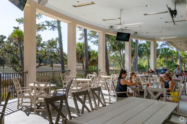 Diners can enjoy a meal overlooking the natural beauty from the Moss Creek clubhouse veranda.
