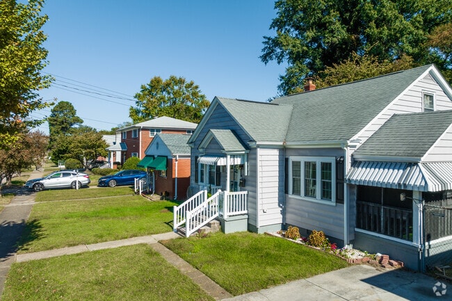 This row of homes features cape cod and brick architecture in Marshall.