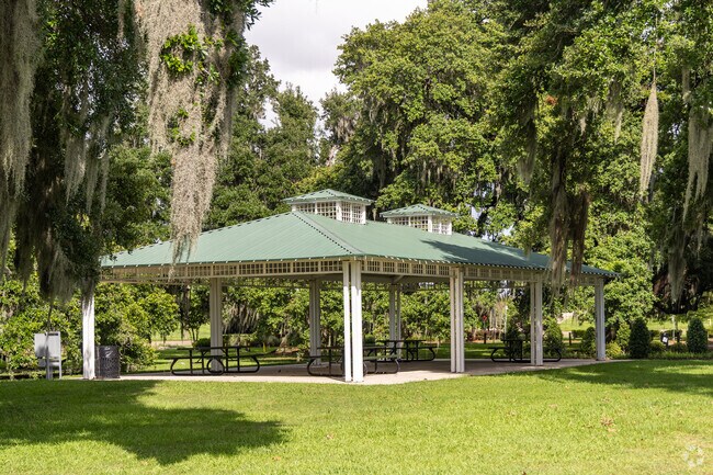 Waggaman residents enjoy picnics under the shaded pavilions at Thomas Jefferson Park.