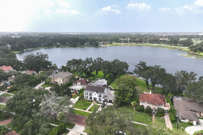 The aerial view of lakeside luxury homes on Spring Lake is beautiful.