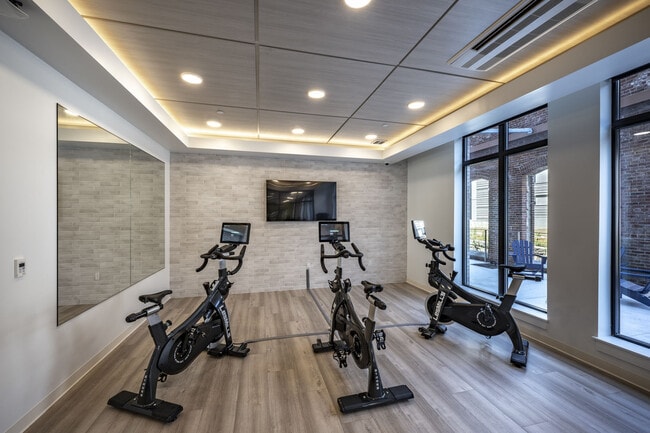 Cycling Room With Bikes, Tv And Mirror.