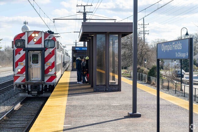 The Metra train goes from the Olympia Fields station to downtown Chicago in roughly an hour.