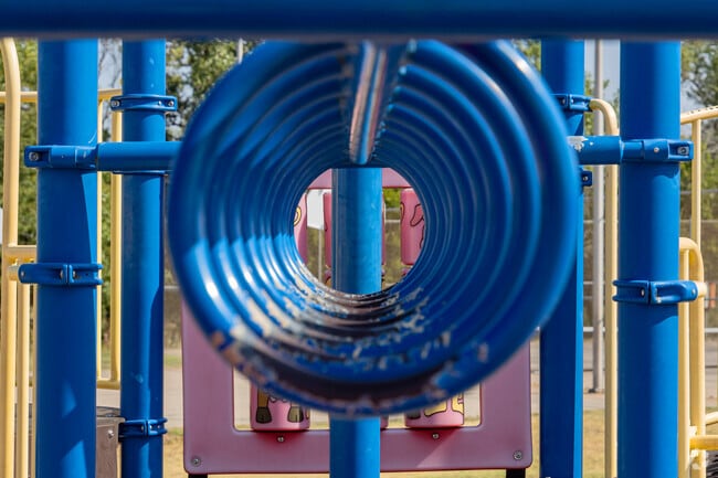 Monkey around on Hefner Park's playground in Mayview.