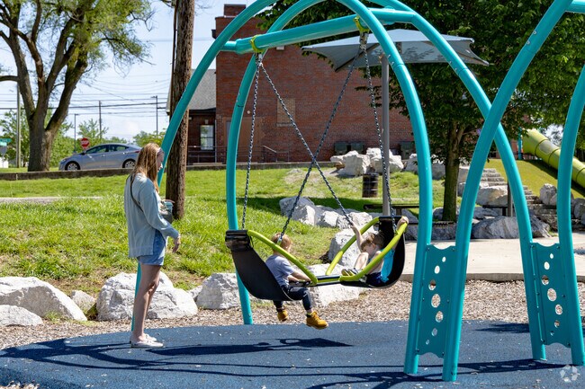 Charles Young Park has a variety of playground equipment, including swings and slides.
