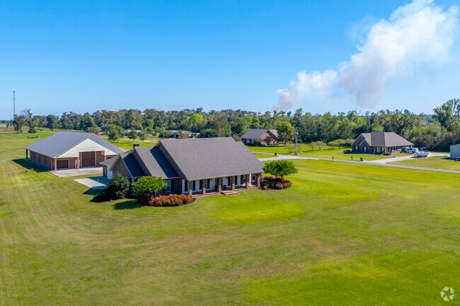 Many of the homes in Cut Off are Acadian Style, with large sloped roofs.