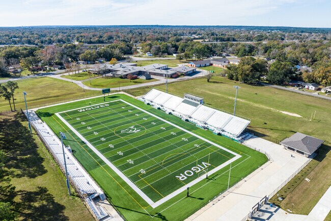 Lush green football field in Prichard's Vigor High School.
