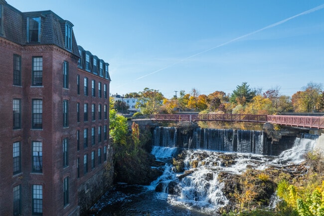 Look out or walk across the Spicket River at the Mills Falls Apartments in Methuen.