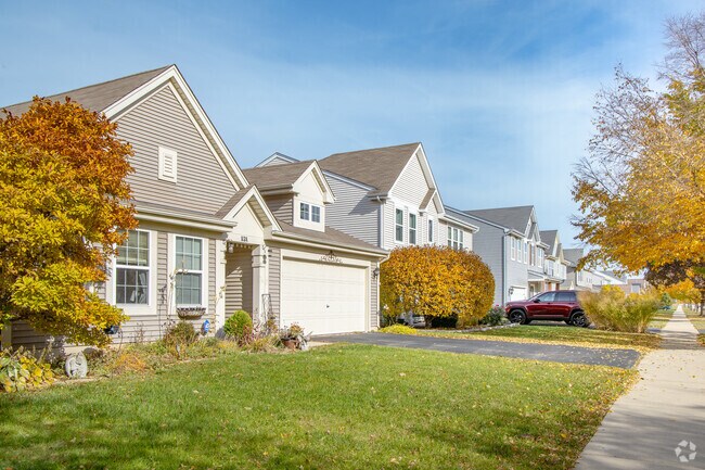 Tree-lined streets and traditional homes create a picturesque setting in Cortland.