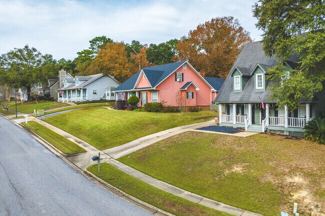 Milkhouse homes are sometimes built on elevated lots as the neighborhood is hilly in some spots.