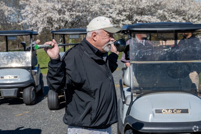 A golfer is about to tee off at Green Hill Golf Course, Worcester.