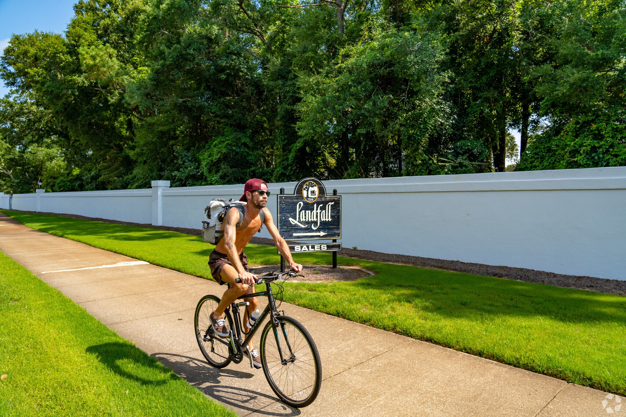 Pedestrians have easy sidewalk access from the entrance to the Landfall bneighborhood.