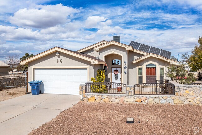 This ranch-style home in Vado has a 2-car garage and solar.