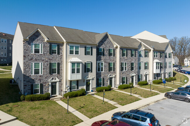 Beechfield has three-story modern townhomes available with walk up path.