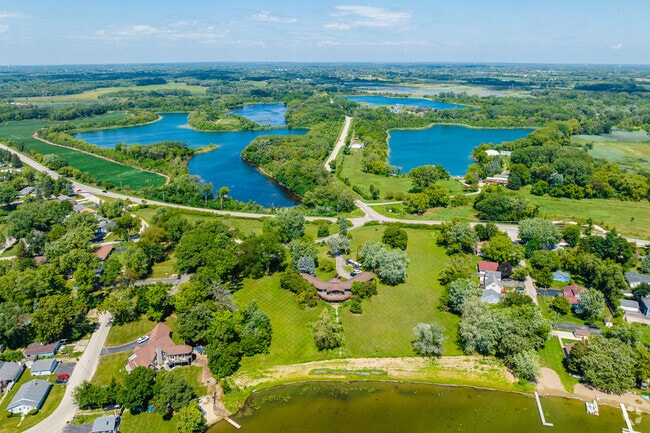 Holiday Hills connects quiet neighborhoods to expansive natural parks and lakes.