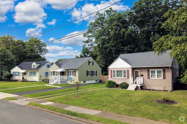 Charming Cape Cod homes line the neighborhood, where tree-lined sidewalks invite easy strolls and a strong sense of community.