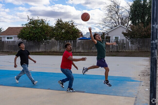 Families in Ford City gather at Franklin Field Complex for games and community events.