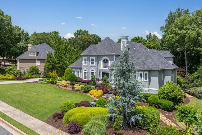 Architectural variety is one of Seven Oaks' strengths, with custom homes like this one that blend classic elements with modern style.