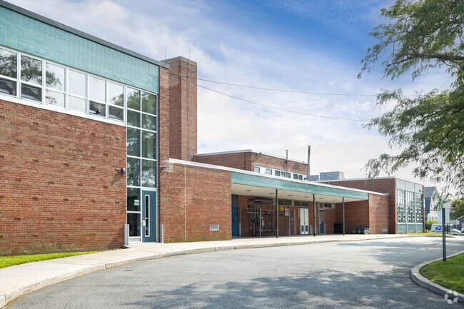On the side of the Leo F Giblyn School in Freeport, NY is a circular driveway for drop offs.