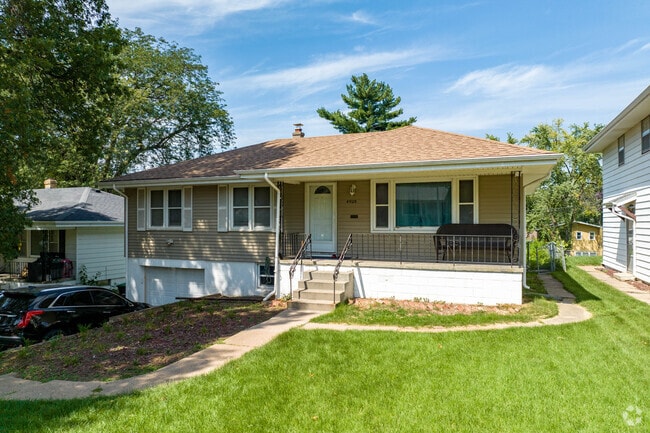 Homeowners in the North Omaha neighborhood take pride in their homes with well-manicured lawns.