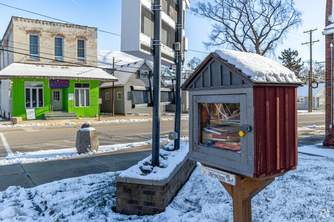 A little free library is located near downtown in the neighborhood of Burlington.