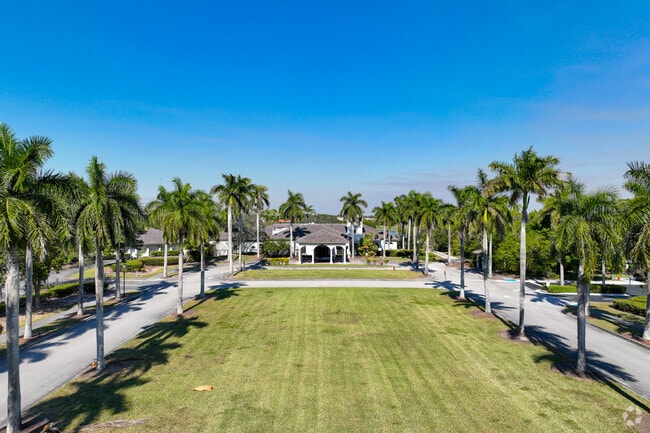 Front view of one of the clubhouses in Heron Bay.