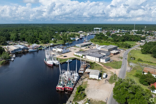 Shrimp boats line the bayou in Bayou La Batre, ready to supply Mobile with fresh seafood.