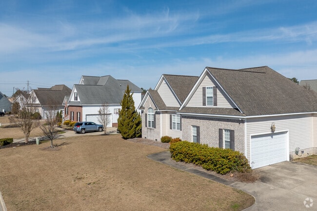 Two-story traditional homes in Winterville's newer subdivisions are near downtown.